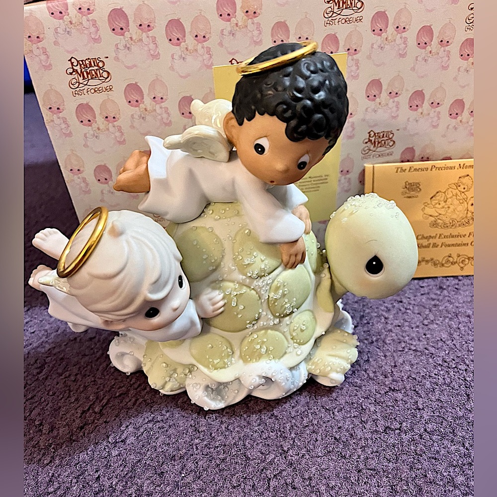 CHAPEL EXCLUSIVE “There Shall Be Fountains of
Blessings" Precious Moments Figure